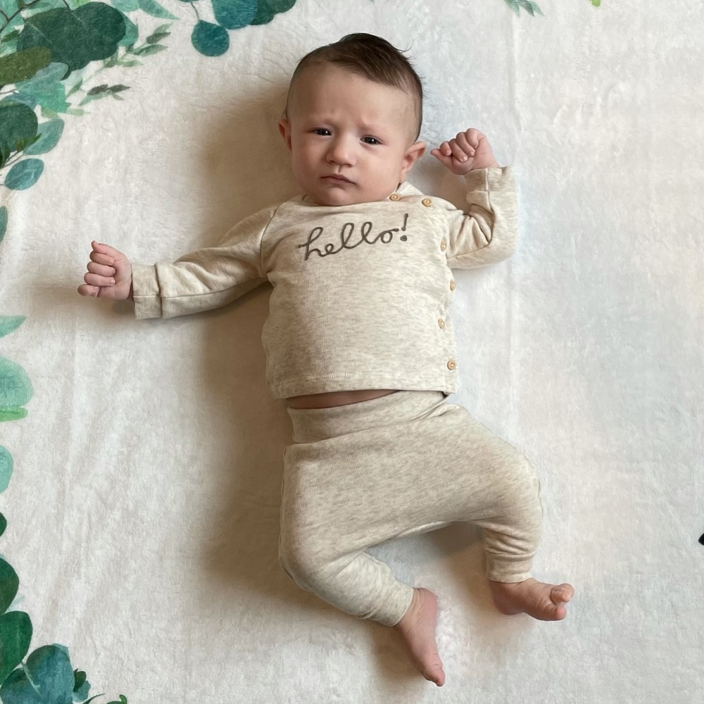 H&M 0-1 months. Worn once for this picture.